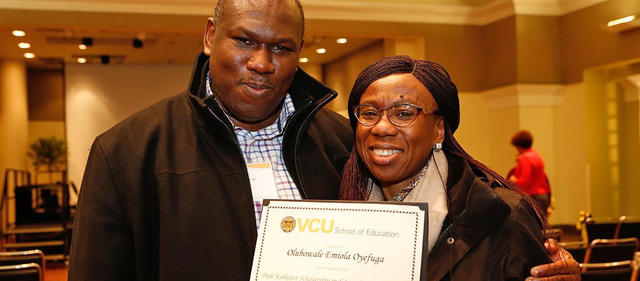 Olubowale Oyefuga and her brother display her scholarship at the 2018 VCU SOE Scholarship & Awards Ceremony.