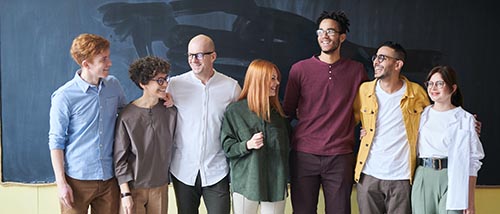 Students in front of a blackboard.
