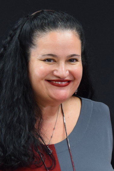 Headshot of Luciana de Oliveira, Ph.D., taken August 2021.