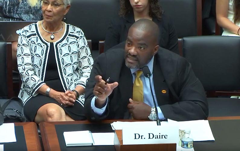 Andrew Daire, Ph.D., dean of the VCU School of Education, testifies at the U.S. House on Wednesday. Behind him to the left is Terry Dozier, RTR executive director.