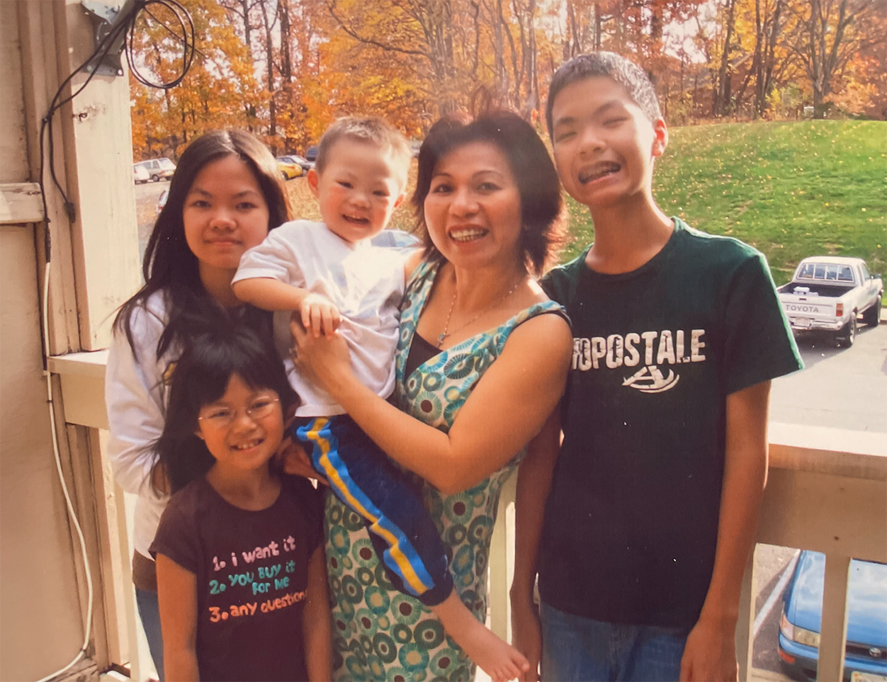 SOE master's student Julie Nguyen as a child, with her mom and siblings.