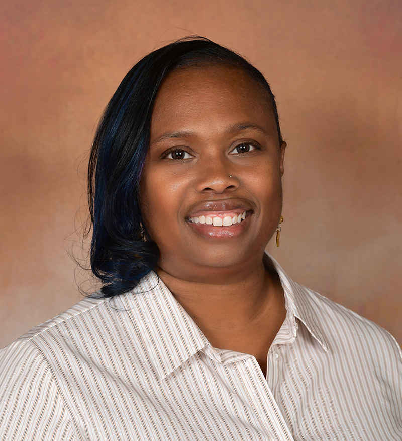 Headshot of SOE doctoral student and Clark Scholar, Shenita E. Williams.
