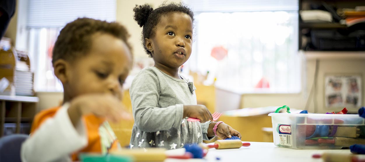 In this undated photo, two children at VCU's Child Development Center work on a craft in Classroom 101. The center has received a grant from the U.S. Department of Education to provide child care services for the children of low-income undergraduate students at VCU. (File photo, School of Education)